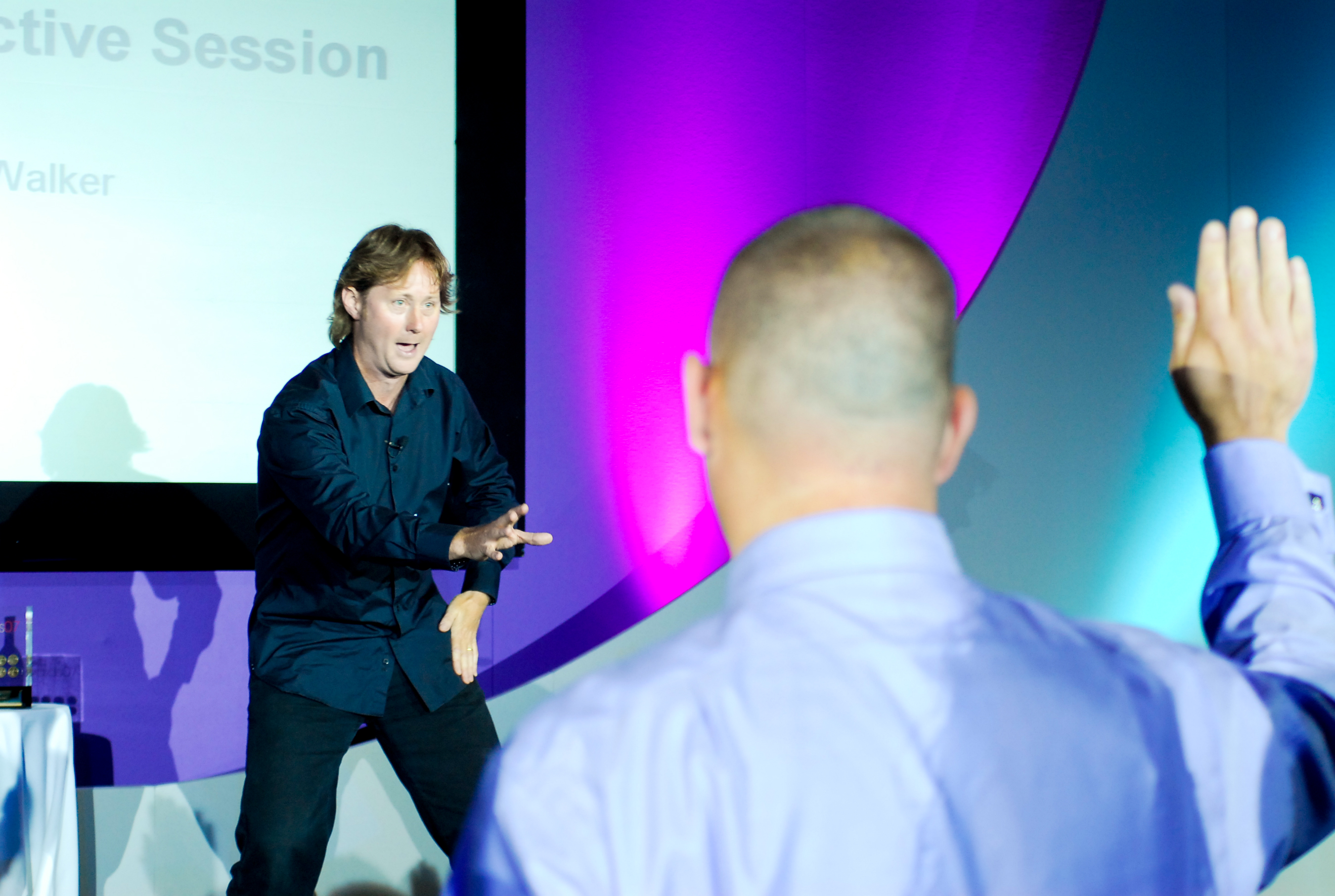 Mark Walker onstage delivering a drum energiser